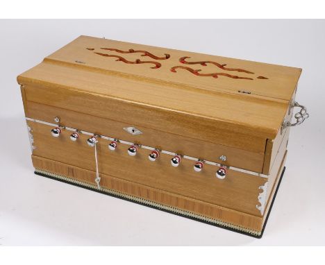 Harmonium,  birch cased and chromed fittings, together with two harmonium books