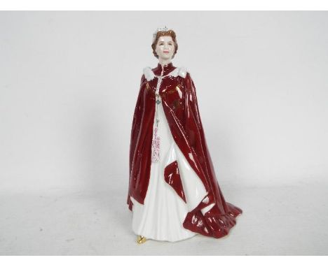 A Royal Worcester figurine depicting Queen Elizabeth II, produced in celebration of the Queen's 80th birthday 2006, approx 23