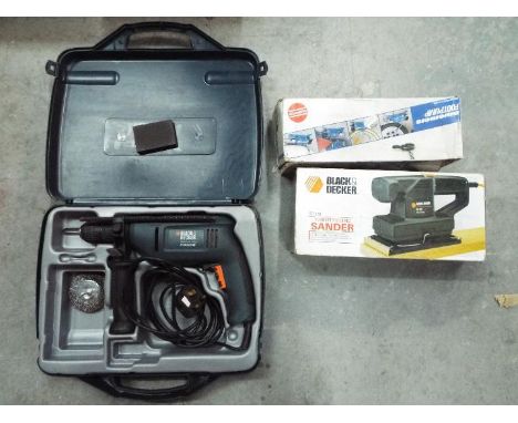 A Black &amp; Decker drill in carry case, boxed Black &amp; Decker sander and a boxed footpump. [3]