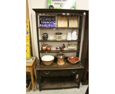 18th century Oak Cottage Dresser, open rack of three shelves above a long single drawer and pot shelf below, raised on square