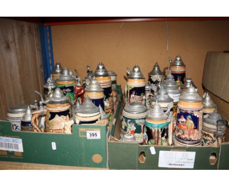 Collection of vintage ceramic German Beer steins with pewter lids to include Musical examples