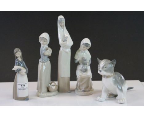 Three Nao ceramic Figurines, a Lladro Figurine and a Nao Cat