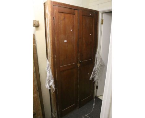 Large Late 19th / Early 20th century Pine Cupboard, the two doors opening to reveal shelf above a hanging space with hooks, 2