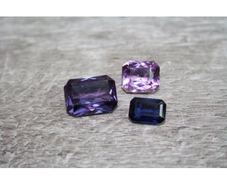 Three loose mixed cut gemstones comprising amethyst, synthetic blue sapphire and synthetic colour change sapphire (3)