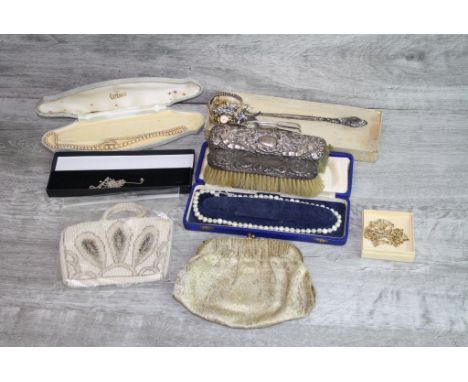 Two silver fiddle pattern teaspoons, two silver backed clothes brushes (one af) silver handled button hook, silver cross neck