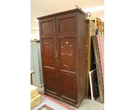 Large 19th century Pine Hall Cupboard, the two doors opening to reveal hanging space with rail and shelf above, 229cms high x