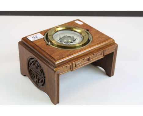 Ships Compass set on an Oriental Carved Wooden Stand