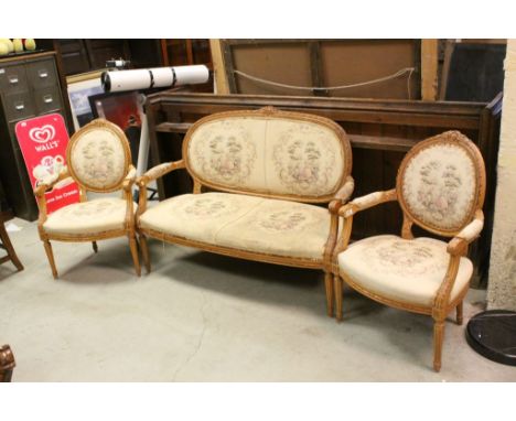 19th century Style French Salon Suite comprising a Two Seater Settee and Matching Elbow Chairs, each piece with carved bow cr