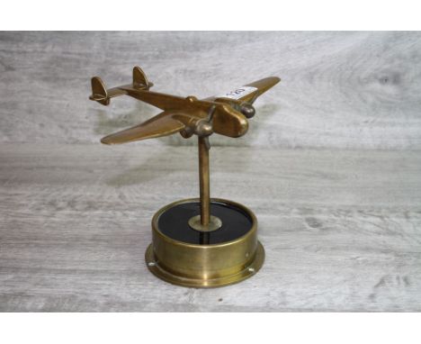 Brass Model of a Handley Page Fighter Airplane set on a plinth made from an instrumental part of a Handley Page Plane