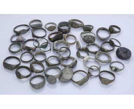 Miscellaneous, Assorted silver (2) and bronze (40) finger rings, Roman to 18th century, including archer’s ring; Islamic seal