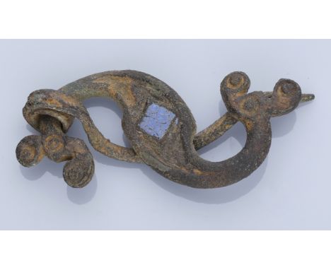 Celtic, Dragonesque brooch, 1st-2nd century, 5.2cm long by 2.2cm wide; a flat plate brooch of reverse S-shape in East Brigant