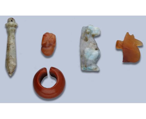Egypt, Middle Kingdom (c. 2055-1650 BC), Carnelian hippopotamus head amulet, 11mm, 0.60g; New Kingdom, red jasper hair ring, 