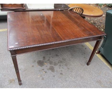 A 1920s mahogany dining table having applied moulding on tapering legs, 29 1/4" h x 53 1/4" w, a late Victorian mahogany musi