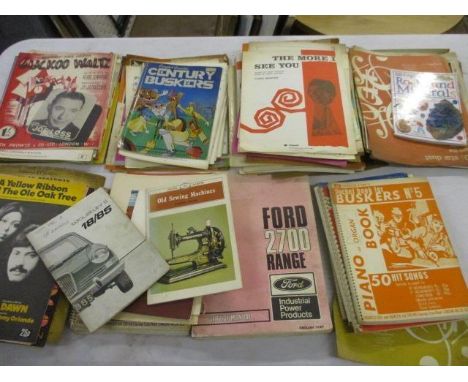 Music sheets, a vintage Ford 2700 Range manual, a Wolseley II 18/85 manual and mixed ephemera, together with a DVD compilatio