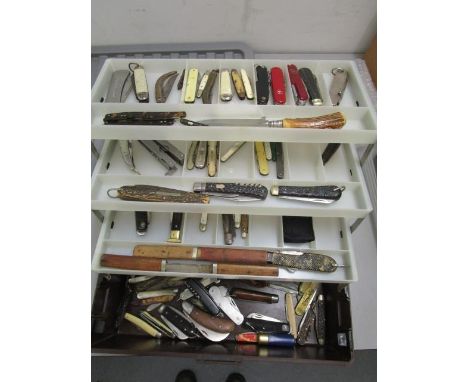 A collection of pocket knives, Swiss Army knives, pen knives, fruit knives and hunting knives, 19th century and later to incl