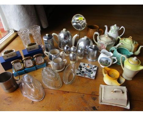 A 1950s Everhot ceramic and chrome breakfast set, various china teapots, mid 20th century glass jelly moulds, Caterpillar com