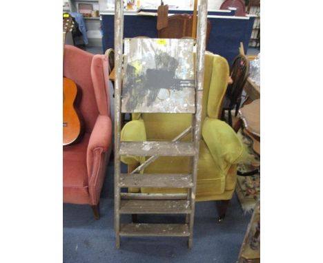A wooden step ladder 