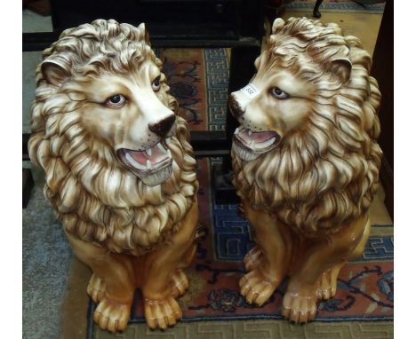 Extremely large pair of glazed ceramic seated lions (height 85cm)