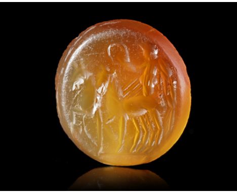 Orange coloured carnelian intaglio showing Victoria driving a slow biga to the left holding high a laurel wreath in salute. T
