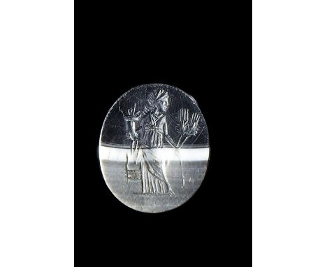 A Roman intaglio of Tyche/Fortuna showing her seated on her rudder to the right and holding a cornucopia and two sprigs of wh