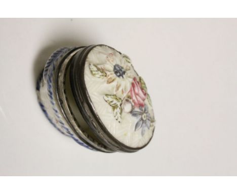 19th Century Continental Ceramic Patch or Trinket box with Floral Basket design, hinged lid and Hallmarked Silver mounts, mea