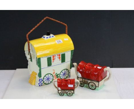 Ceramic Biscuit Barrel in the form of a Shepherd's Hut / Caravan together with Teapot and Sugar Bowl in the form of Wagons