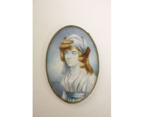 Miniature portrait of a young woman signed J.Shelley