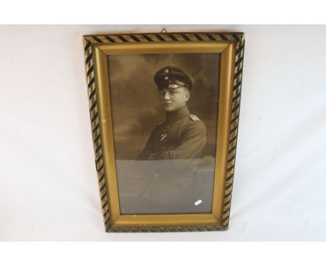 A Large Framed And Glazed Portrait Photograph Of A World War One Iron Cross Awarded German Soldier. Measures Approx 62cm x 41