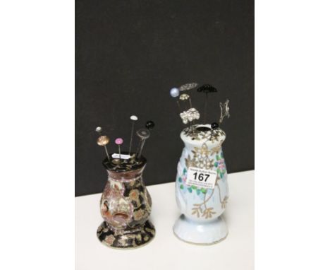 Two vintage Japanese ceramic Hatpin stands with a collection of vintage Hatpins to include Silver and Military button set