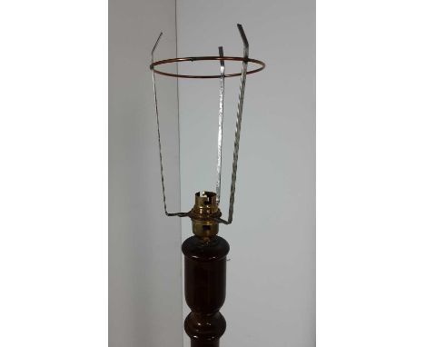 MAHOGANY STANDARD LAMP, with shade and on a circular base185cm high