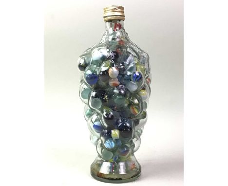 GROUP OF MARBLES, in various sizes and colourways, contained within a glass bottleglass bottle 25.5cm high 