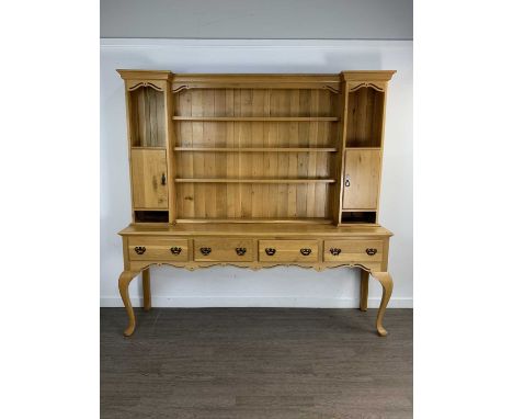 LIGHT OAK KITCHEN DRESSER, with open shelves over a base with four drawers on cabriole legs197cm high, 202cm wideOverall good