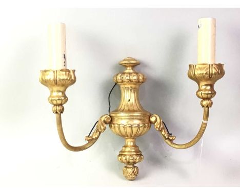 FOUR ORMOLU BRONZE DOUBLE WALL LIGHTS, in the French empire style, all matching32cm highQty: 4