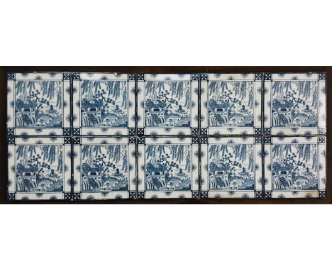 SET OF TEN BLUE AND WHITE CERAMIC TILES, in the Willow pattern, in a wooden frameeach tile15cm x 15cm