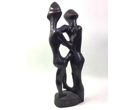 AFRICAN CARVED HARDWOOD FIGURAL SCULPTURE, ALONG WITH TWO FURTHER the other two also figuralthe largest 58cm highQty: 3