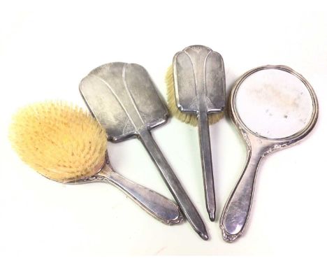 SILVER FOUR PIECE DRESSING SET, VARIOUS MAKERS comprising two hand mirrors and two brushes, each with engine turned decoratio