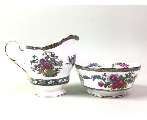 PARAGON TEA SERVICE, TREE OF KASHMIR PATTERN including twelve cups, saucers, side and cake plates, four oval comports, butter
