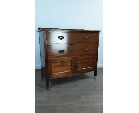 MAHOGANY CHEST, with two drawers over two cupboard doors, on ceramic castors94cm high, 105cm wide