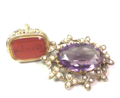 YELLOW METAL BROOCH, AND A SEAL set with amethyst and seed pearl, along with a sealQty: 2