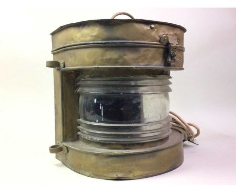 BRASS SHIPS LAMP, EARLY 20TH CENTURY marked Masthead, wired for electricity33.5cm high