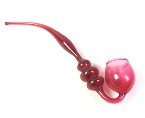 VICTORIAN CRANBERRY GLASS PIPE, IN THE MANNER OF NAILSEA, LATE 19TH / EARLY 20TH CENTURY  with large round bowl36cm long