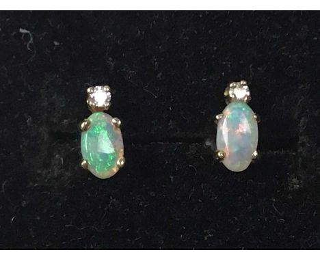 PAIR OF EARRINGS, NINE CARAT GOLD set with opal and diamonds, tested as nine carat