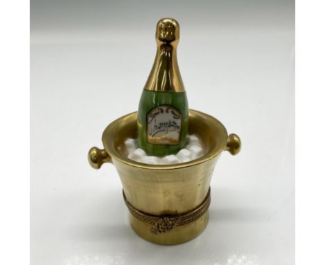 Ring in a new year with this box and store a memento. Champagne bottle in gilt overlay box with grape clasp closure. Chamart 