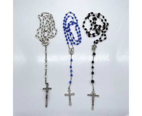 Three beaded rosaries. Silvertone with bright blue beads, 20.25"L. Bronze color metal Lourdes rosary with clear iridescent be