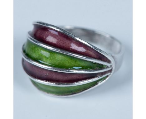Sterling silver ring with green and purple enamel and silver marks on the inside. Size 7.25. 4g. Condition: Age related wear.