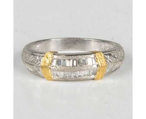 This stunning ring has a beautifully engraved platinum band with 18k gold accents set with diamonds. 18K 750 and PT900 stampe