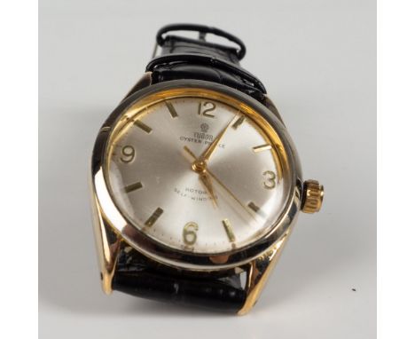 Beautiful self-winding automatic watch with a black leather strap. The serial number is 381578 and the model number is 7965. 