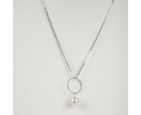 This gorgeous necklace has a 14k white gold chain with a platinum ring and large cultured pearl pendant. The chain is stamped