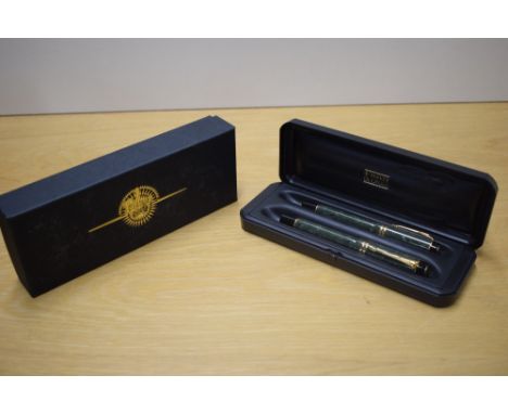 A boxed Parker Duofold International converter fill fountain pen and Rollerball pen in Jade Green with two bands to the cap h