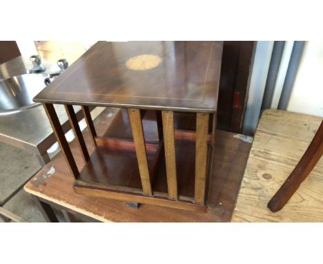  Sale Item:    SMALL TABLE TOP REVOLVING BOOK CASE  Vat Status:   No Vat   Buyers Premium:  This lot is subject to a Buyers P